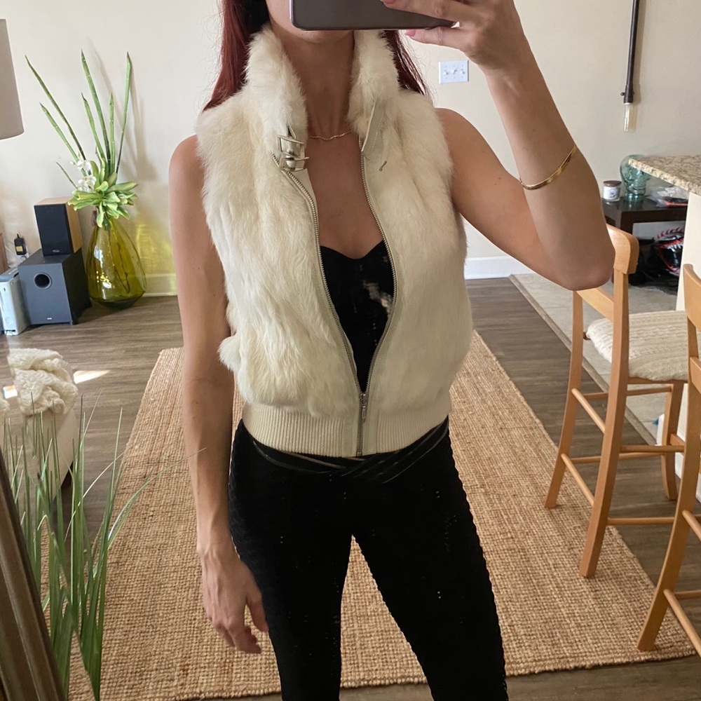 White fur vest